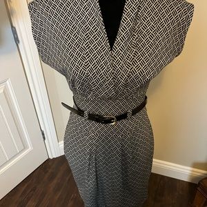 2/$20 item. Black and white patterned dress with belt. Flattering fit. Sz med.